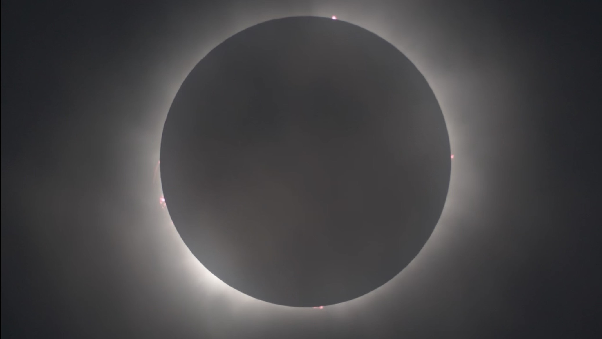 The corona is what the eye sees, but it is not what the computation solves for. Totality is the instant the last of the photosphere is hidden, and the photosphere has no sharp edge, so the moment has to be defined by a chosen radius rather than observed from the image. NASA's Scientific Visualization Studio, from Kerrville, Texas, 2024 April 8 14.